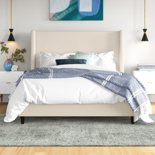 Ana Upholstered Wingback Bed