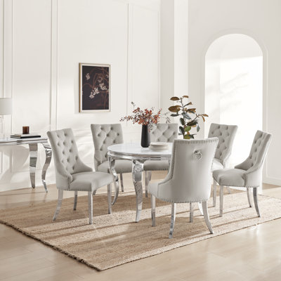 Bilche Round White Marble Glass & Metal Table With Eubanks Velvet Knockerback Dining Chairs