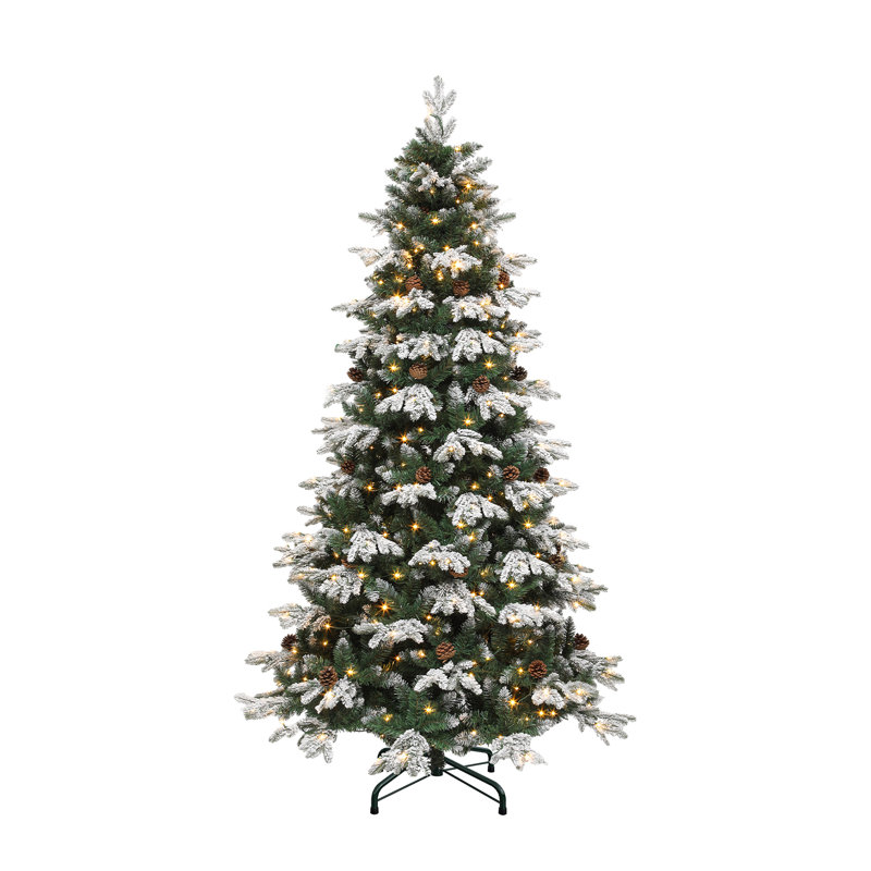 Arbre de Noël vert floqué pré-éclairé avec pommes de pin