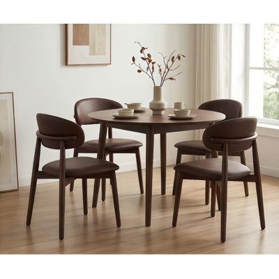 Chaise de salle à manger rembourrée avec assise en similicuir, chaise de cuisine avec structure en bois massif, chaise d'appoint moderne à dossier incurvé