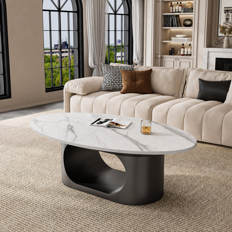 Table basse ovale moderne de 125 cm (49,2 po), plateau en pierre frittée imitation marbre, piètement minimaliste en métal sculptural, montage facile