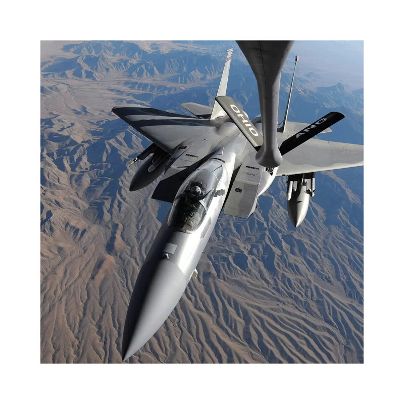 F-15 Eagle Flies Toward The Boom Of A KC-135 Stratotanker by Stocktrek Images - Wrapped Canvas Print