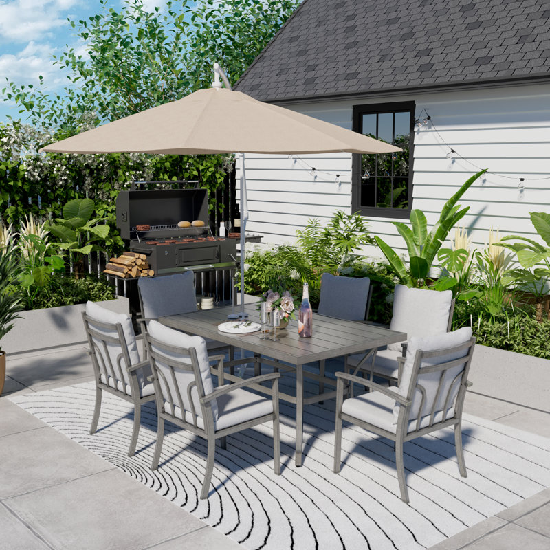 Germien 6 - Person Patio Dining Set with Rectangular Table , Cushions Included