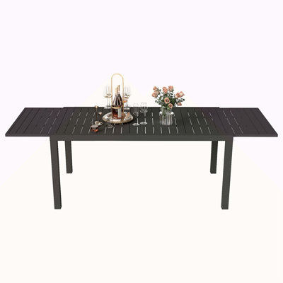 Table de salle à manger extensible en aluminium 97,2 po L
