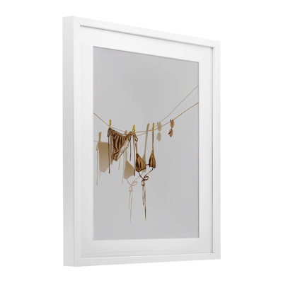 Sunlit Bikini on Clothesline Framed Print Under Glass, design by Ziwei Li