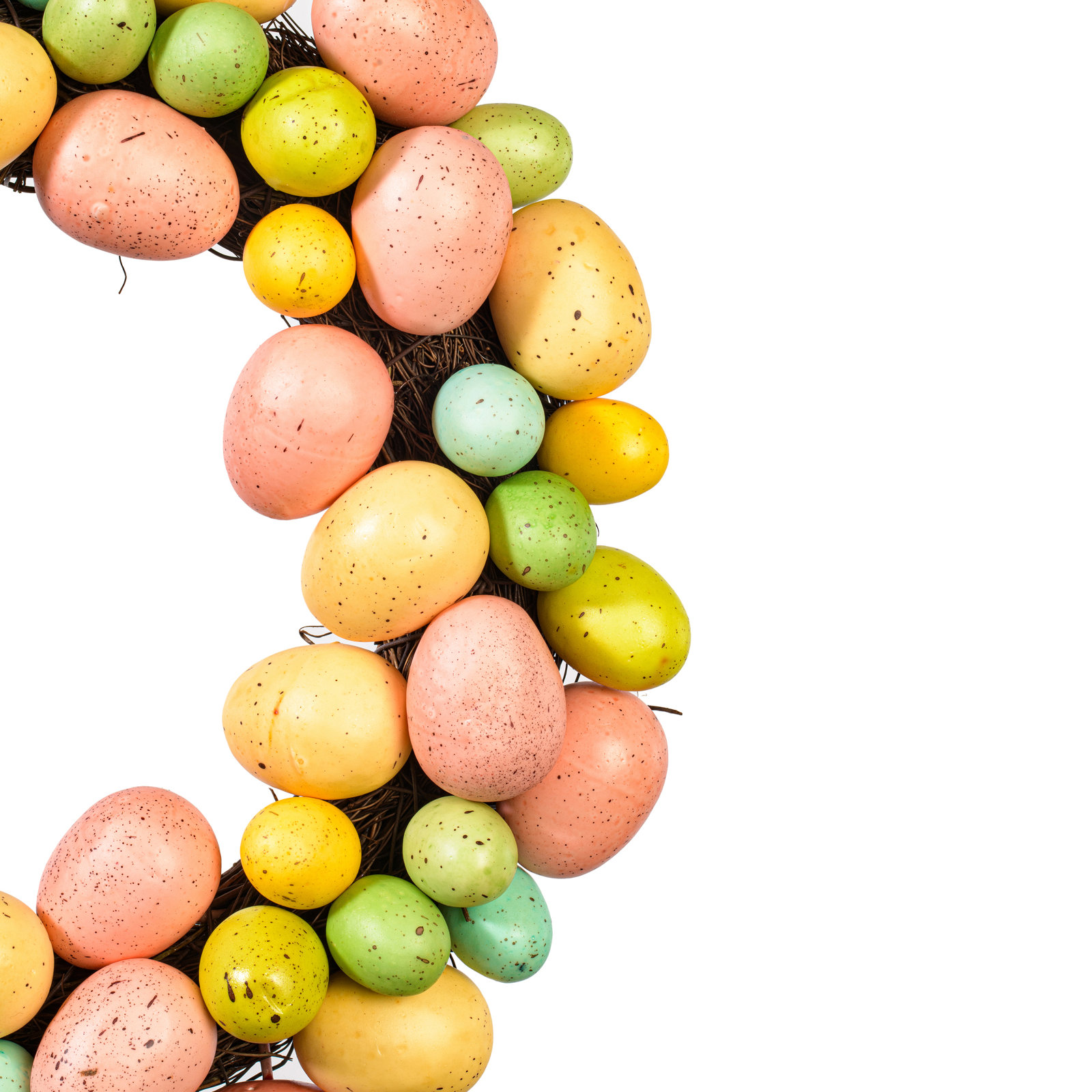 13" Artificial Pastel Easter Egg Wreath on a grapevine base.