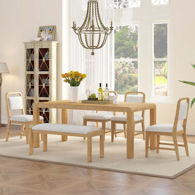 Vintage Extendable Dining Table Set with Curved Design and Upholstered Seating