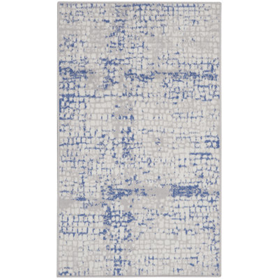 Tapis abstrait en polypropylène tissé à la machine en ivoire / bleu