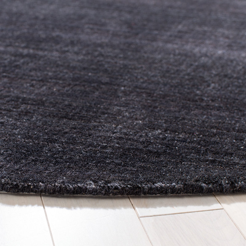 Addisyn Hand Tufted Wool/Cotton Solid Color Rug in Black, Round 6' x 6'