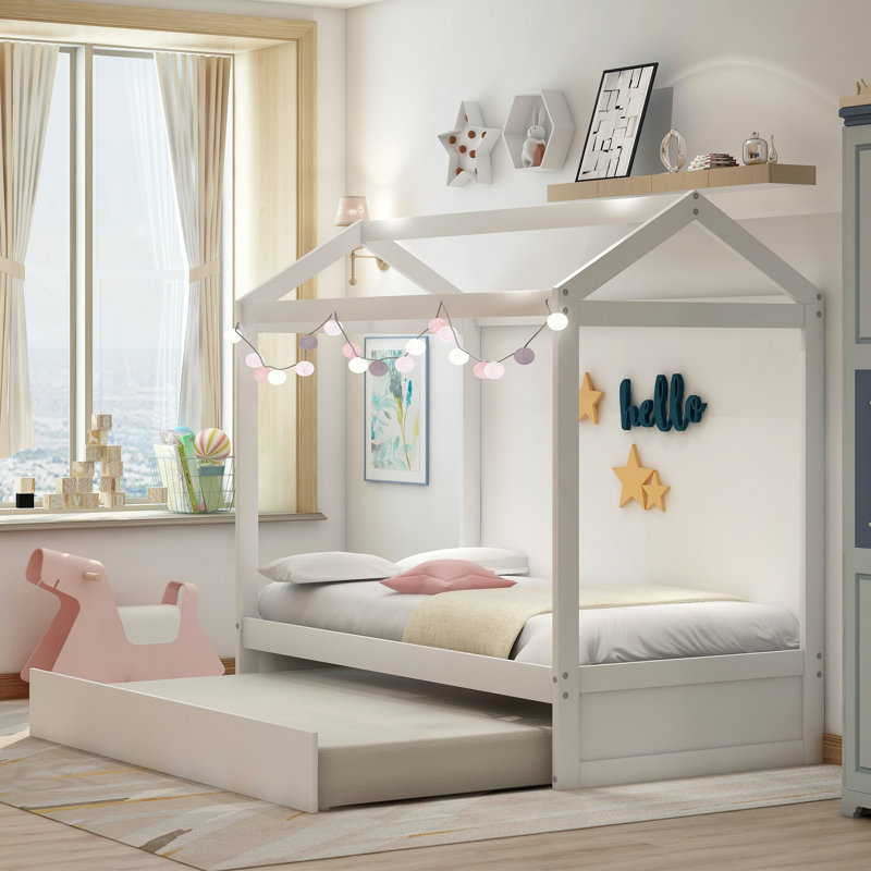 Lit de jeu avec lit gigogne pour un décor personnalisé et un espace de sommeil supplémentaire