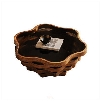 Table basse moderne en forme de nuage avec plateau en verre et base ondulée pour le décor du salon