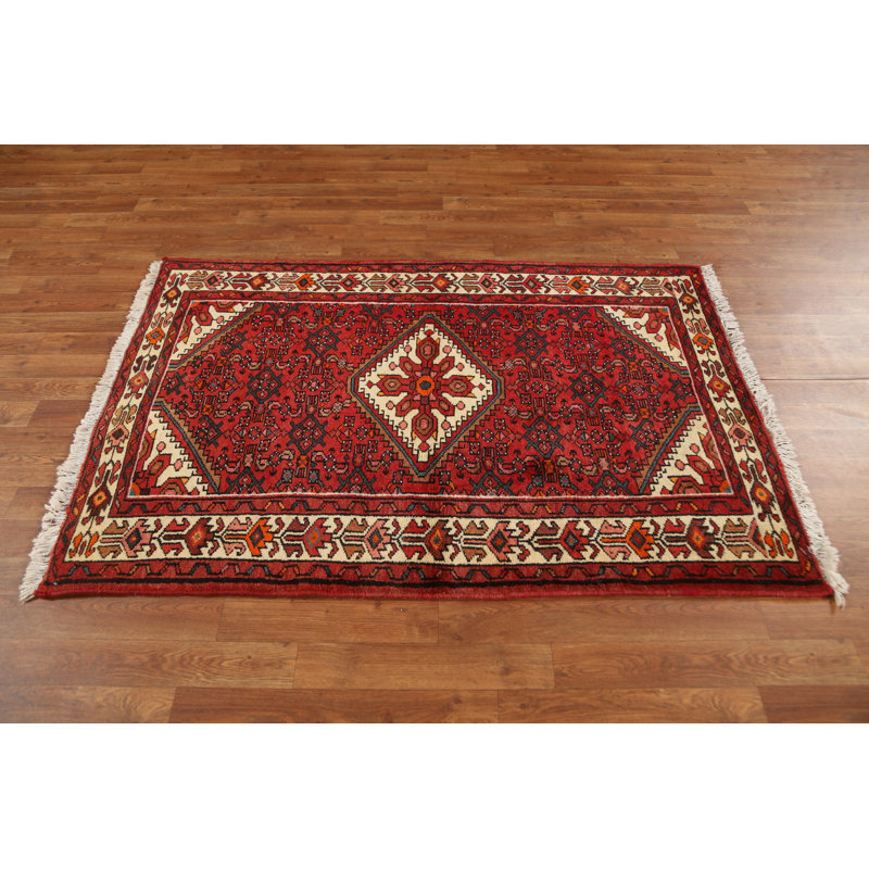 Tapis rouge à motif géométrique 3x5