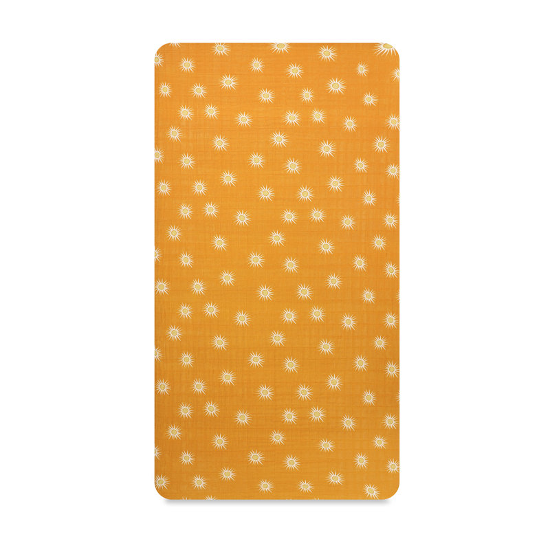 Golden Hour Organic Cotton Toddler Crib Sheet with Sunburst Pattern