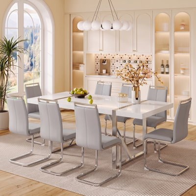 9-Piece Modern High-Gloss Manufactured Wood Dining Table Set with Faux Leather Cantilever Chairs