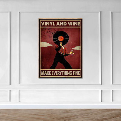 Homme avec vinyle et vin