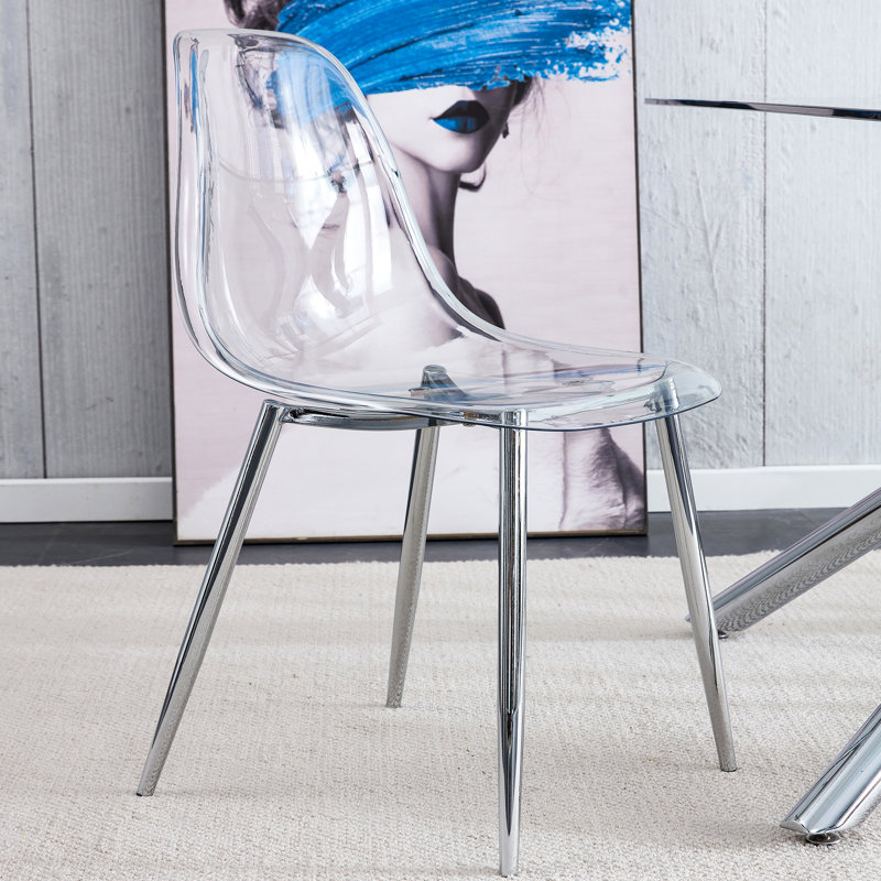 Chaise de salle à manger ergonomique élégante et confortable avec des pieds en métal, idéale pour divers environnements de salle à manger et une expérience culinaire améliorée.