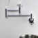 Kingston Brass Wendell Two-Handle 1-Hole Wall Mount Pot Filler Faucet with Knurled Handle