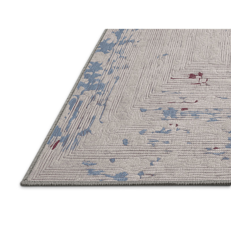 Tapis gris lavable à la machine