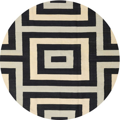 Tapis géométrique noir / beige