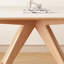 Table Rock minimaliste crème avec pieds en bois-106687037