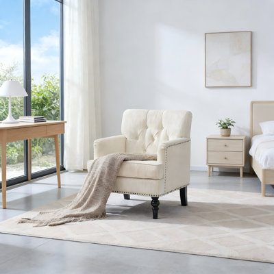 Fauteuil d'appoint rembourré avec garniture cloutée