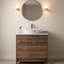Lavabo de salle de bain rond en céramique blanche brillante de 40 cm (16 pouces) à poser, avec surface lisse émaillée.