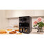 Double friteuse à air 11QT, fonctions 10 en 1, friture à l'air, cuisson, déshydratation et réchauffement, revêtement antiadhésif, écran tactile à DEL, fonctionnement silencieux.