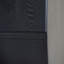 Console moderne noire avec motif nervuré