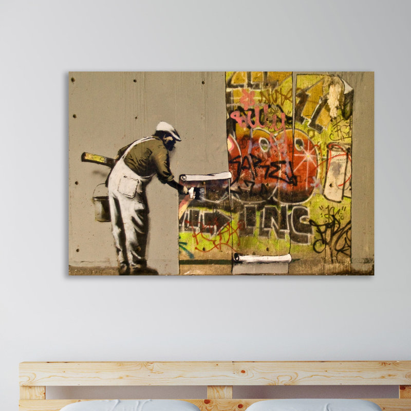 Graffiti Wallpaper by Banksy - Wrapped Canvas Print, 81 cm H x 122 cm W x 3 cm D