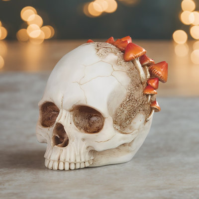 Figurine crâne avec champignon