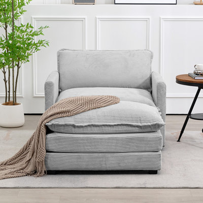 Fauteuil en velours côtelé avec repose-pieds Redenius