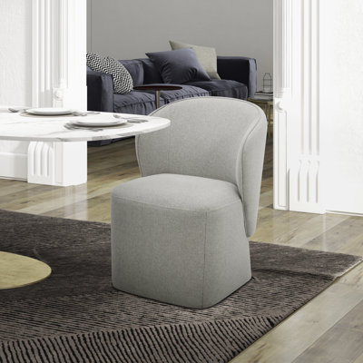 Chaise rembourrée Faouzi avec roulettes