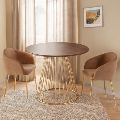 Table de salle à manger d'intérieur avec plateau rond en bois massif et piètement en fer doré, quatre couverts, hauteur fixe