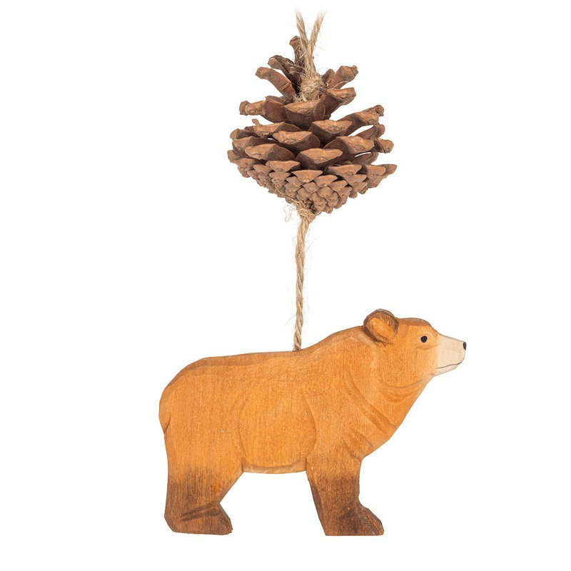 Ornement suspendu en forme d'ours sculpté et pomme de pin