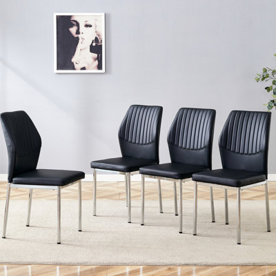 Chaise de salle à manger luxueuse 4 pièces noire avec pieds en métal argenté, lignes lisses, assise confortable pour éponges de résilience prolongées, aspect tendance