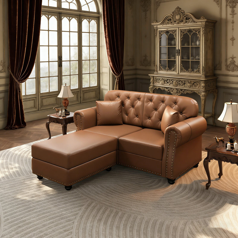 Canapé Chesterfield de style Mid-Century avec similicuir, capitonnage, garniture cloutée et accoudoirs roulés, comprend 2 coussins
