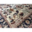 Tapis bleu et ivoire de haute qualité noué à la main