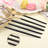 Matte Gold And Silverware Set With Black Handle
