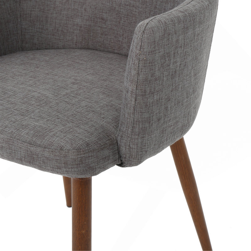 Chaise de salle à manger à soutien profilé avec tissu de haute qualité et structure en fer durable, parfaite pour les intérieurs modernes et élégants.