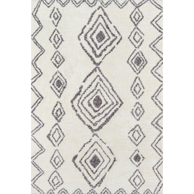 Tapis géométrique gris