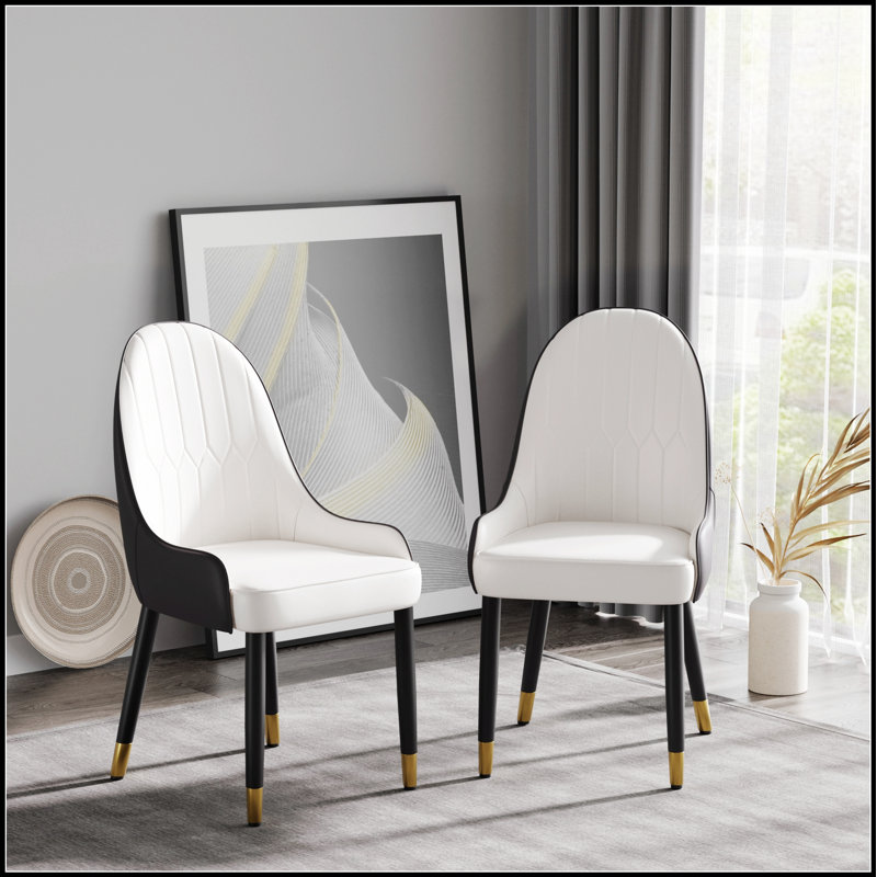 Chaise de salle à manger élégante à deux tons avec un design ergonomique et des pieds en métal durables pour une assise confortable dans divers environnements