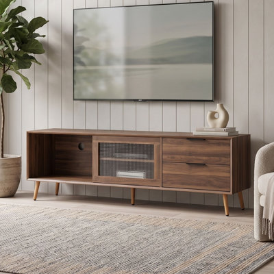 Meuble télé moderne avec portes coulissantes en verre, tiroirs de rangement, pieds en bois massif et passe-câbles.
