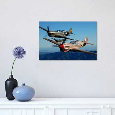 P-40 Warhawks Flying Over Chino, California II by Phil Wallick - Wrapped Canvas Print