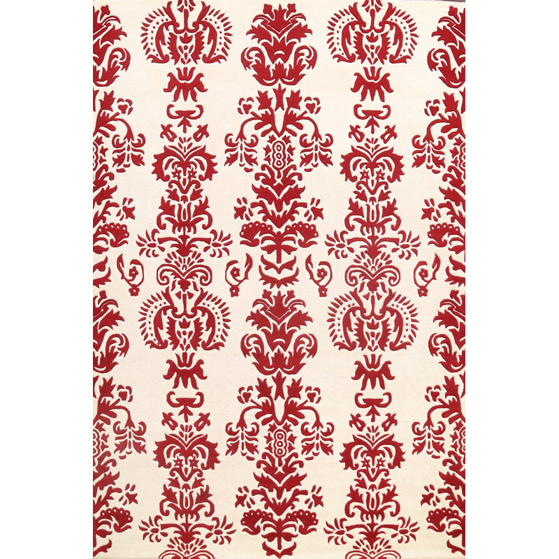 Tapis ivoire / rouge en laine touffeté à la main