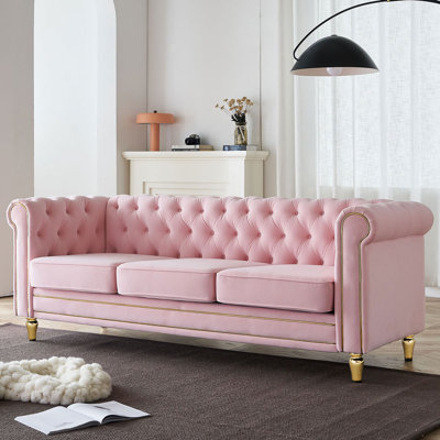 Canapé Chesterfield en velours à accoudoirs roulés Gevon