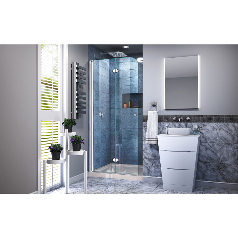 DreamLine Aqua Fold 36 inch D x 36 inch W x 74 3/4 inch H Frameless Bi-fold Shower Door in Chrome with Center Drain Biscuit Shower Base Kit