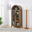 Une armoire de rangement arquée haute avec une lampe-892020589