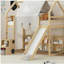 Wooden cabin frame with a tented loft bed