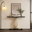 Console décorative au design luxueux noir et or clair, surface résistante aux égratignures et profil mince compact pour les vestibules modernes.