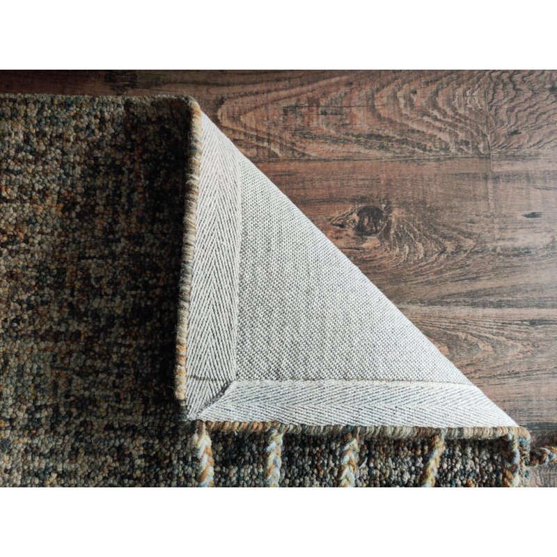 Erric Handmade Tufted Forest Green Rug, Rectangle 5' x 8'